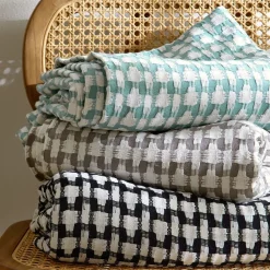 Becquet Plaid et jetés bicolores tissés jacquard< Jeté De Canapé, Jeté De Fauteuil|Les Matières
